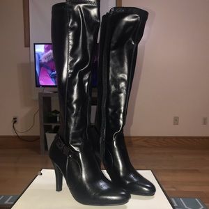 Lightly worn knee high heeled boots